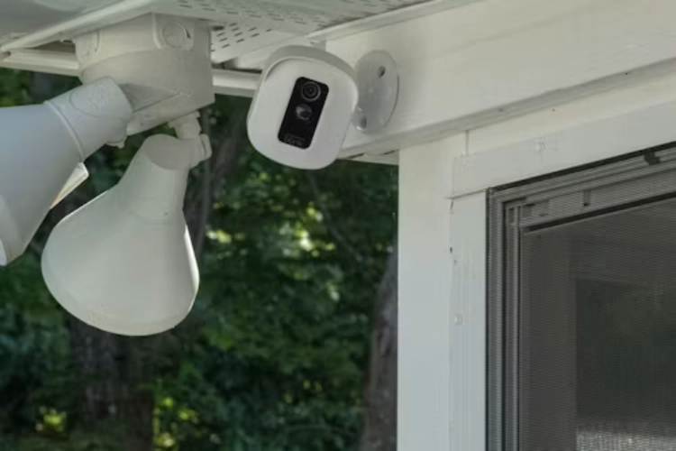 a surveillance camera under the eaves
