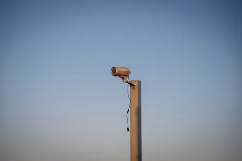 camera against a blue sky